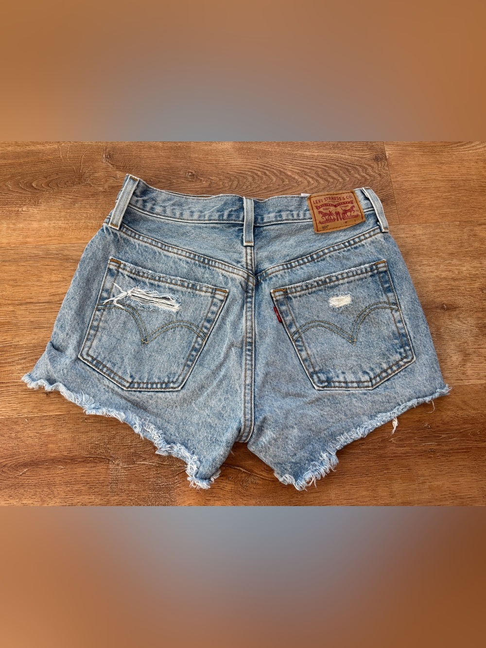 Levi's Light Blue Frayed Denim Cutoff Shorts